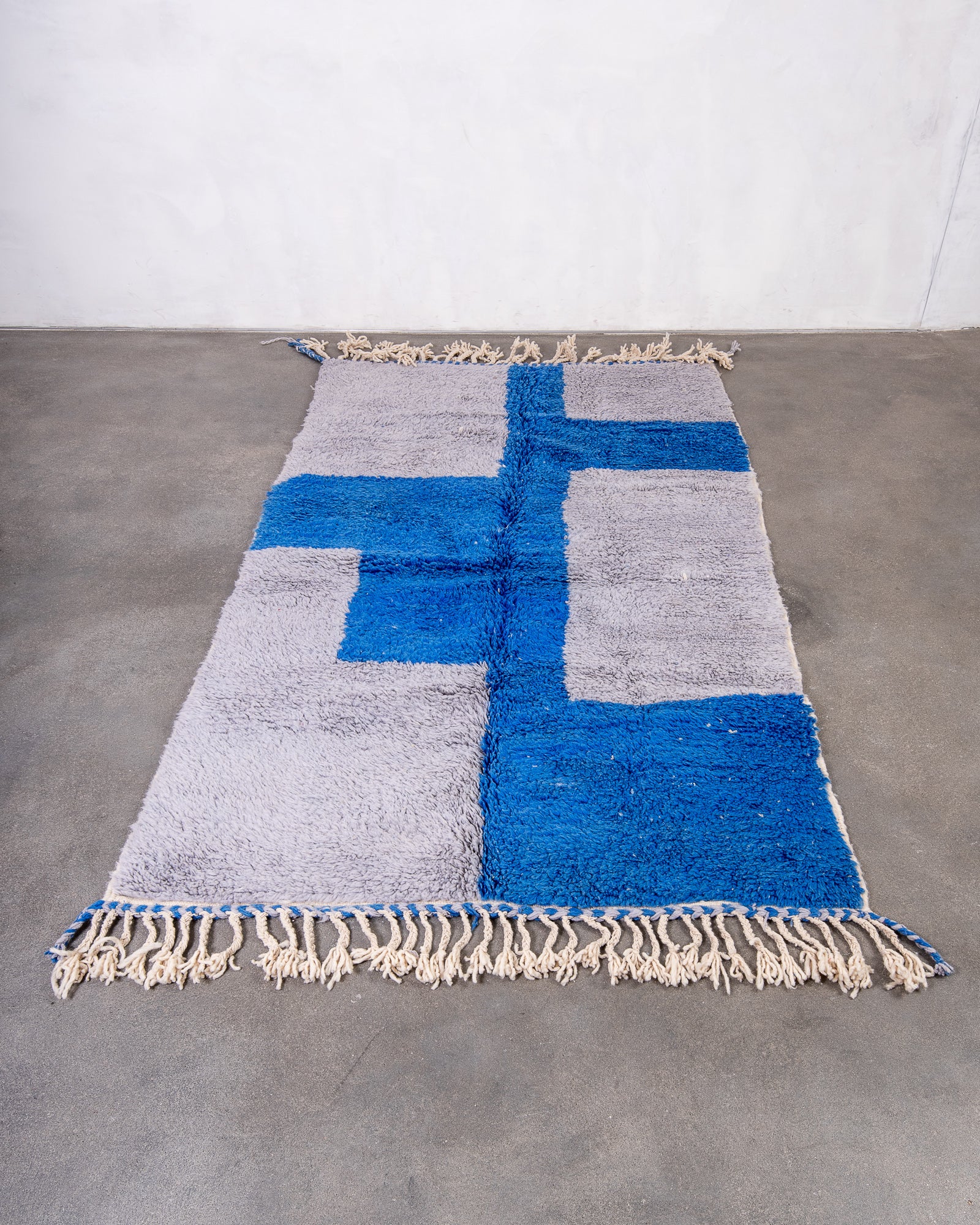 Modern, designer, handcrafted Berber rug from Morocco. Beniourain carpet with beautiful colours and patterns and fluffy wool texture.